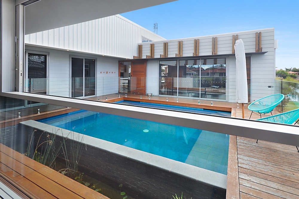Pool in the centre of a custom built home at Runaway Bay