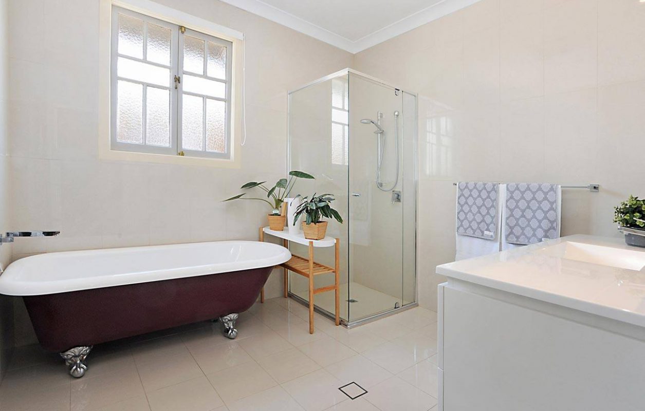 Renovated bathroom at Holland Park featuring a free standing bath